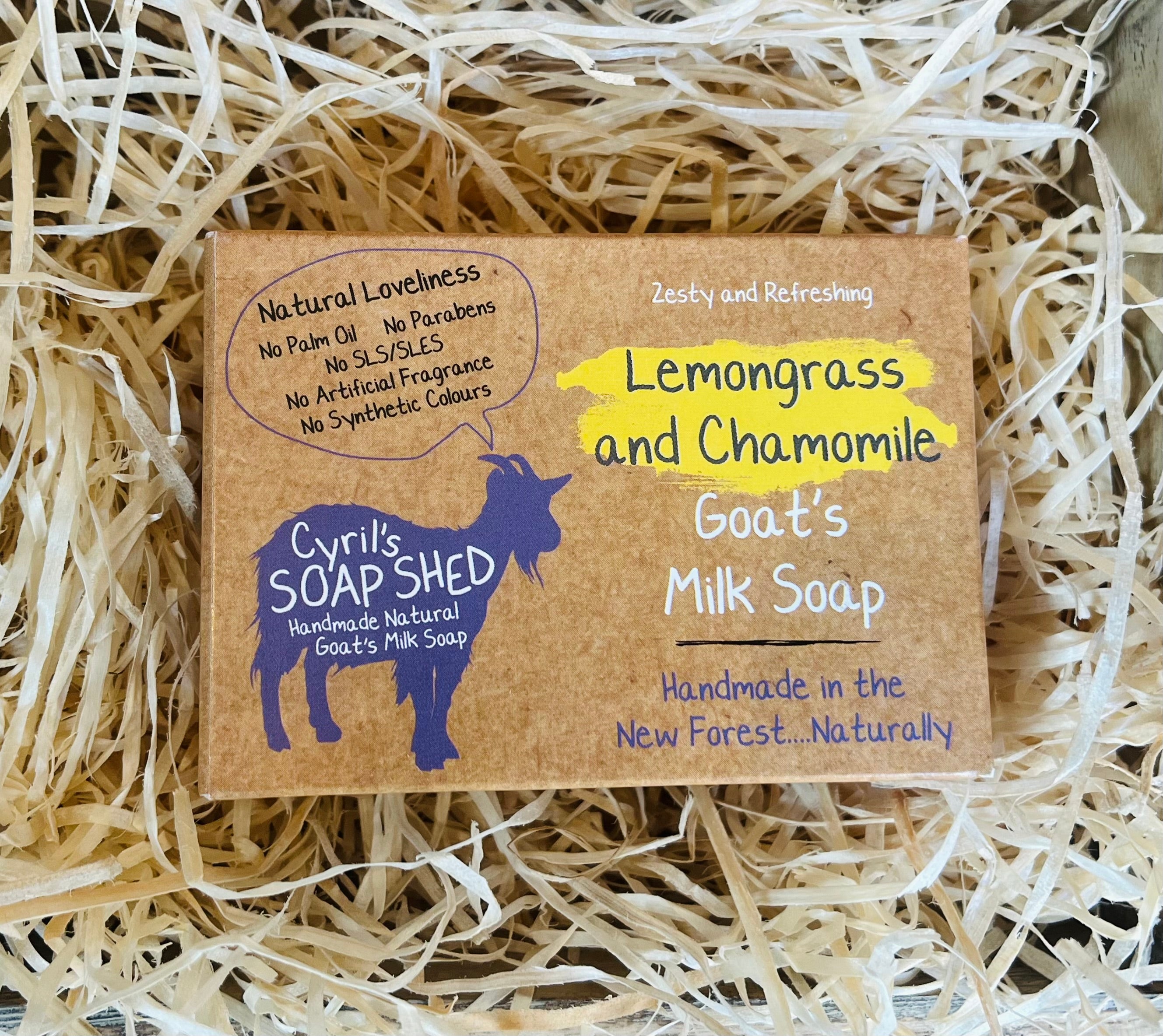 Goat's milk soap packaging with lemongrass and chamomile scent on a bed of straw.