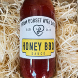 Bottle of From Dorset With Love Honey BBQ Sauce – artisan Dorset BBQ sauce with honey.