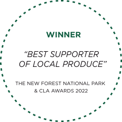 Winner badge for 'Best Supporter of Local Produce' at The New Forest National Park & CLA Awards 2022.