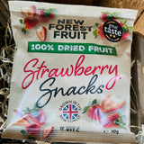 Pack of New Forest Fruit strawberry snacks on a wooden surface