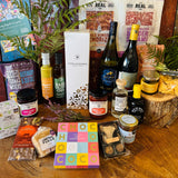 The Real Cure Dorset charcuterie with Spanish Reganas crackers, Olives et Al olives and Little Bee Bakery Cheesy B's in a New Forest celebration hamper
