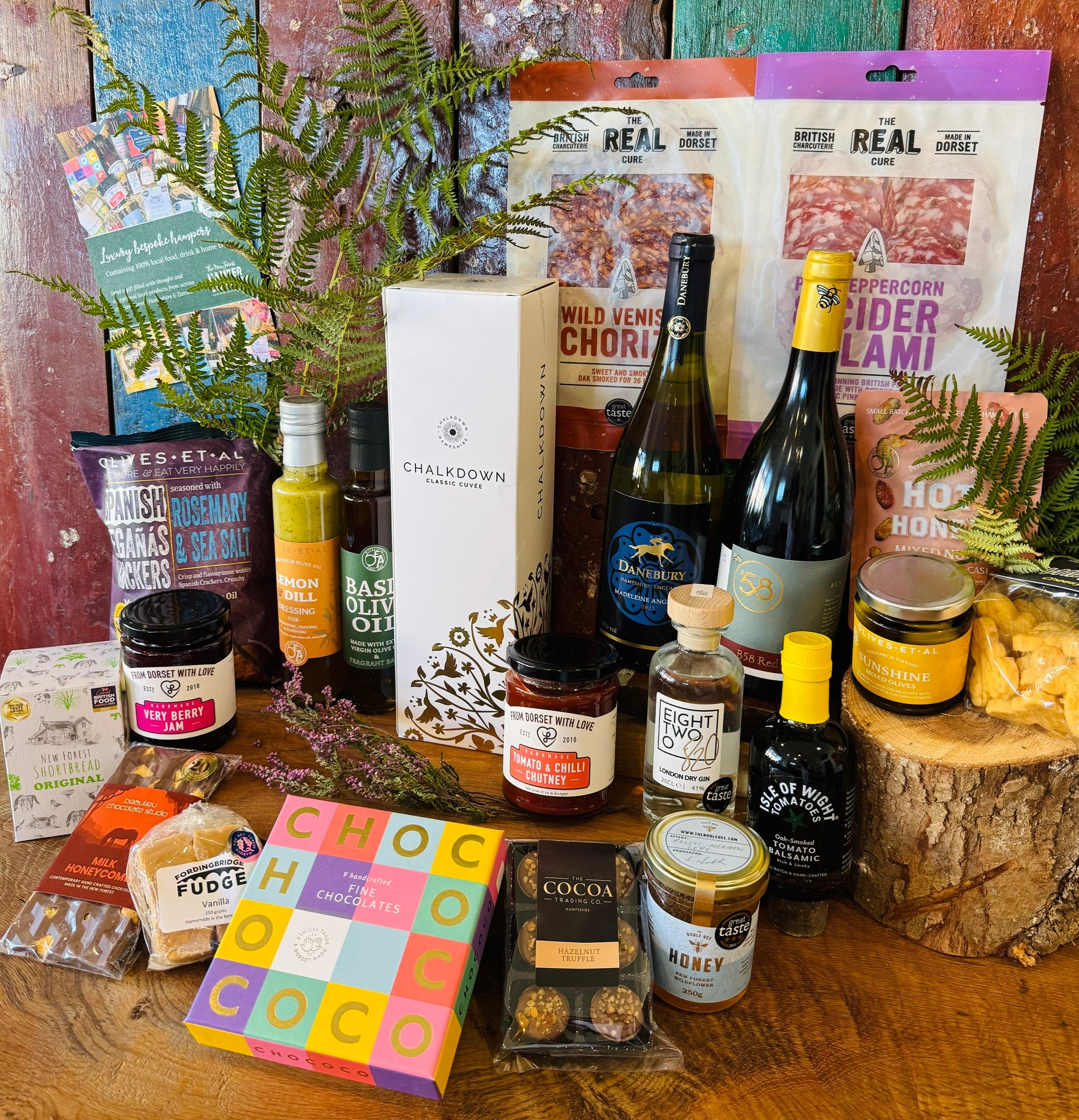 New Forest wildflower honey, Very Berry jam, Tomato & Chilli chutney and Isle of Wight oak-smoked tomato balsamic in a 20 inch lidded willow hamper