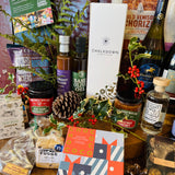 Festive hamper contents including Chococo chocolates, Beaulieu chocolate Christmas tree, mince pie fudge and ginger shortbread