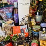 Dorset charcuterie, Spanish Reganas crackers and Olives et Al olives in a festive New Forest willow hamper