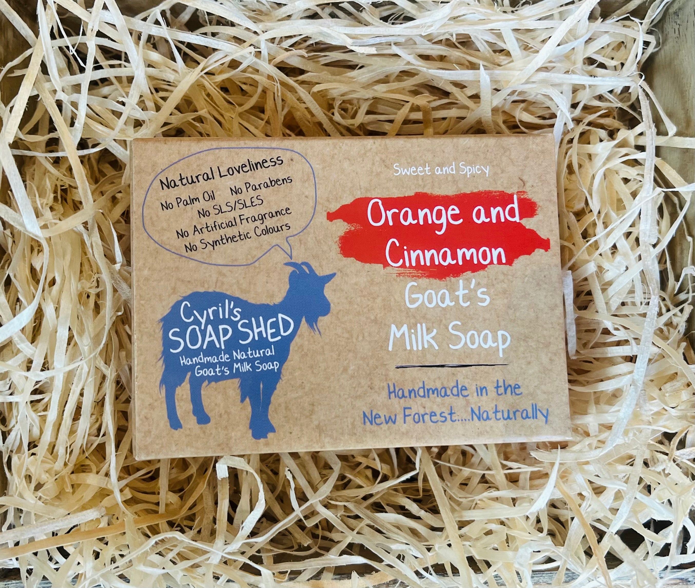 Cyril's Soap Shed goat's milk soap packaging on a bed of straw