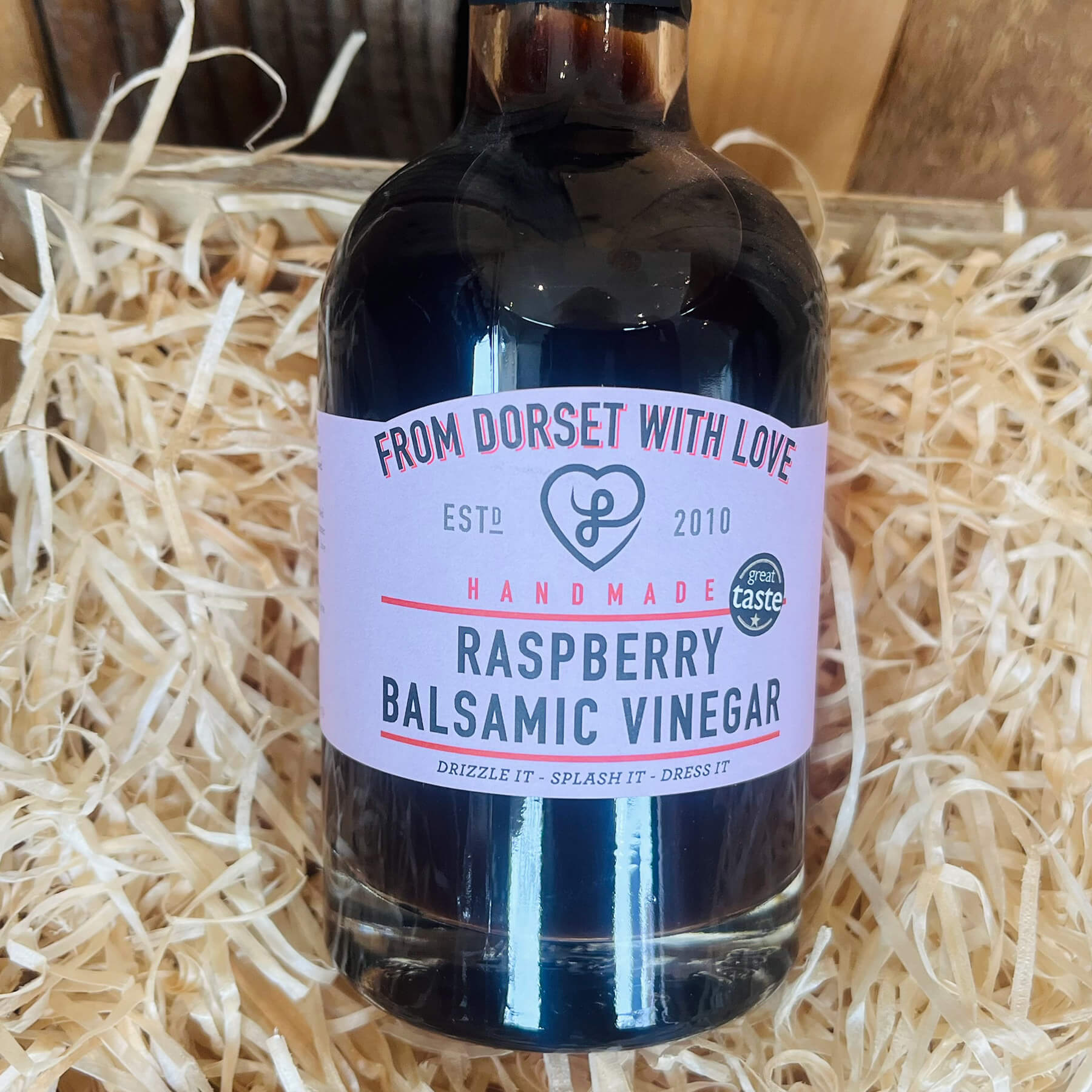 Bottle of From Dorset With Love Raspberry Balsamic Vinegar – artisan Dorset raspberry vinegar.