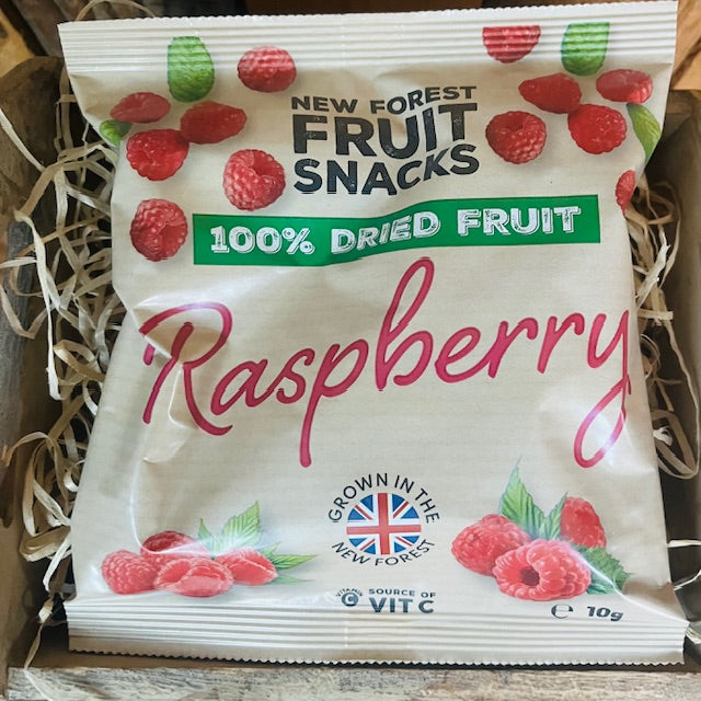 Pack of New Forest Fruit Snacks raspberry dried fruit on a wooden surface