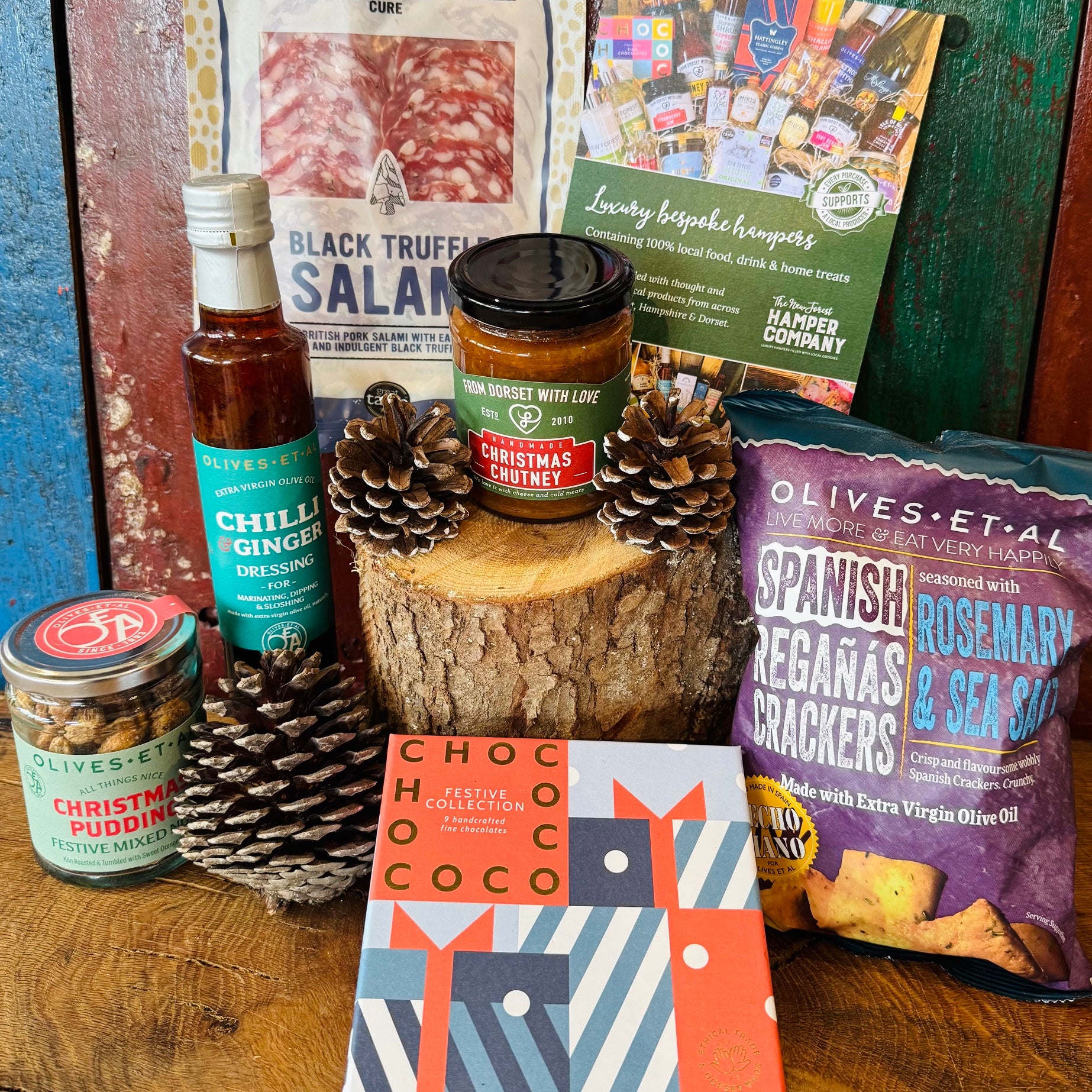 Festive Dorset Giftbox contents styled for Christmas with Chococo festive chocolate collection, Dorset charcuterie and festive chutney
