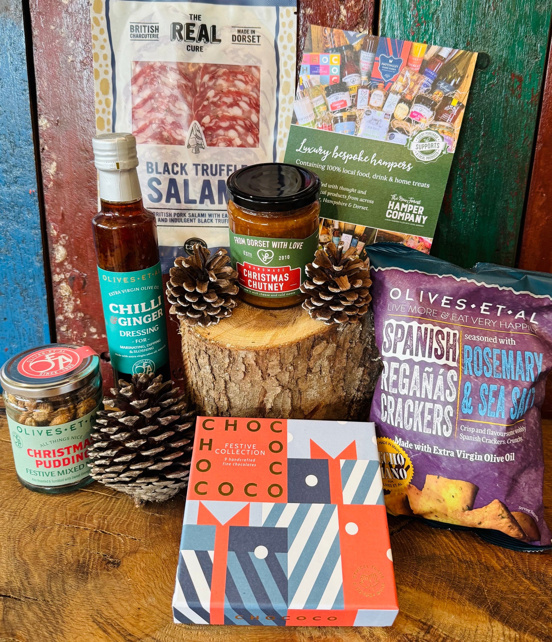 Festive Dorset Giftbox contents styled for Christmas with Chococo festive chocolate collection, Dorset charcuterie and festive chutney