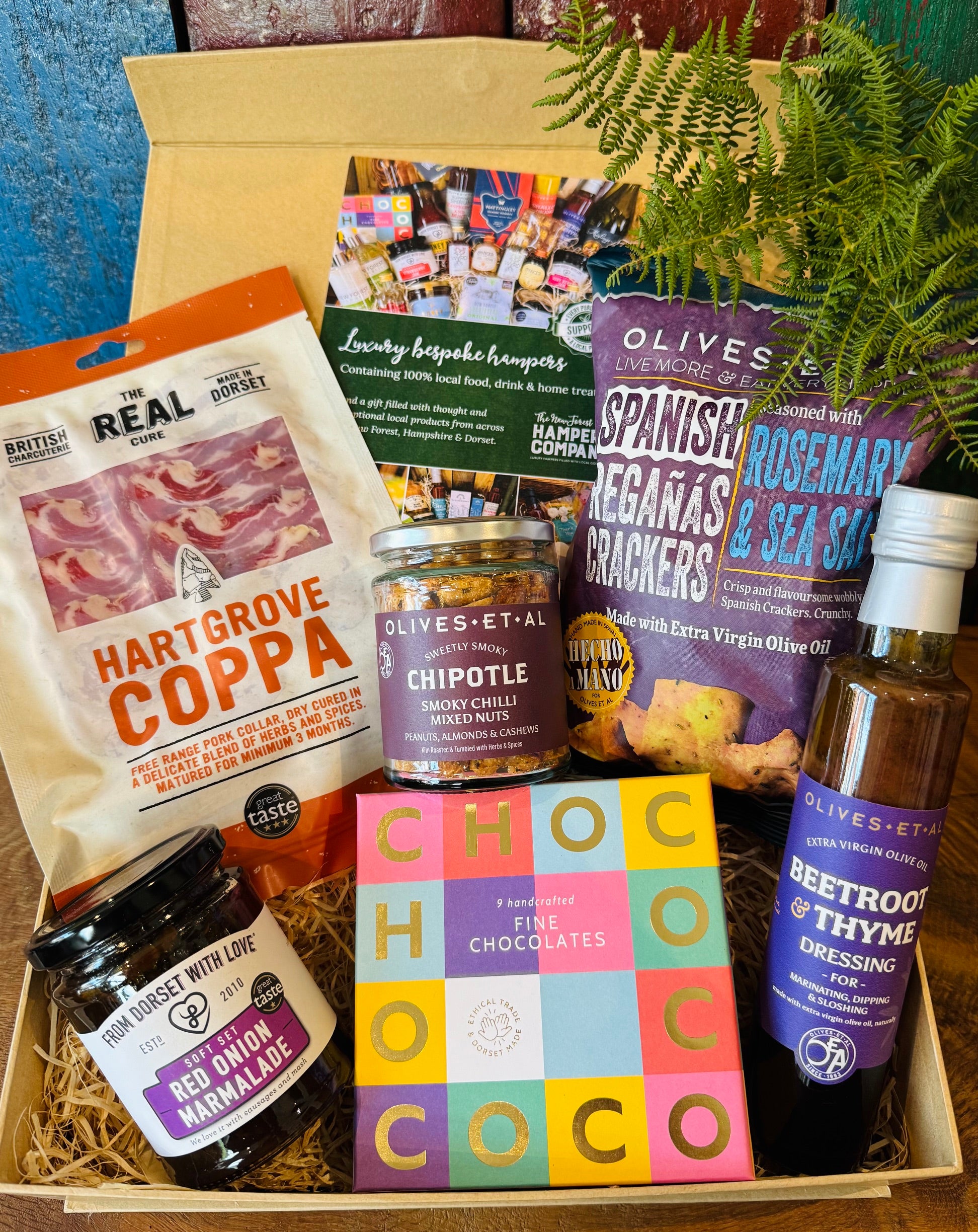 Dorset Giftbox packed with Real Cure Hartgrove Coppa, Chococo handcrafted chocolates, Olives et Al Reganas crackers and smoky chipotle nuts, red onion marmalade and beetroot and thyme dressing