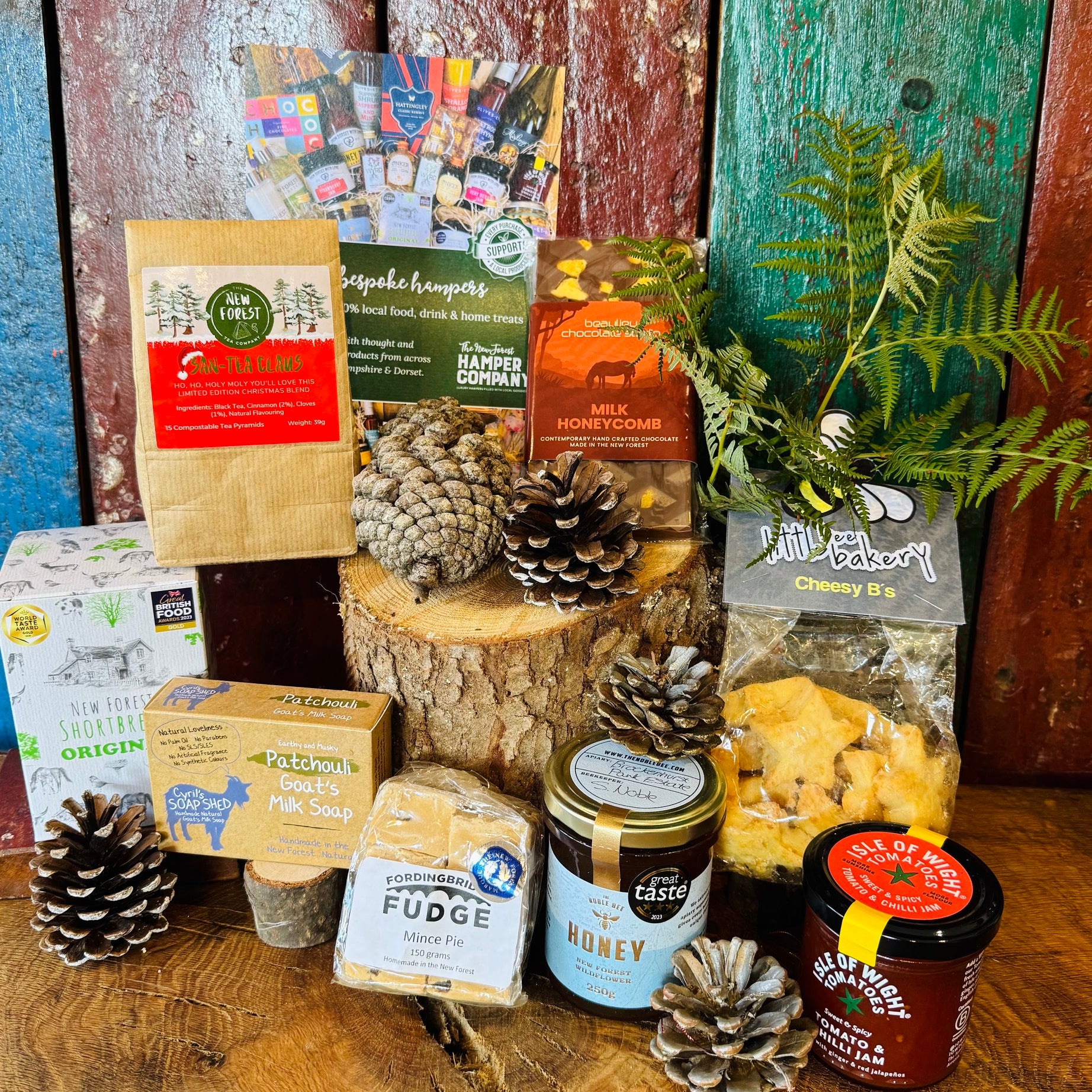 Festive Hampshire Giftbox contents displayed with San-Tea Claus limited edition Christmas tea, Great Taste three star honey and Fordingbridge mince pie fudge