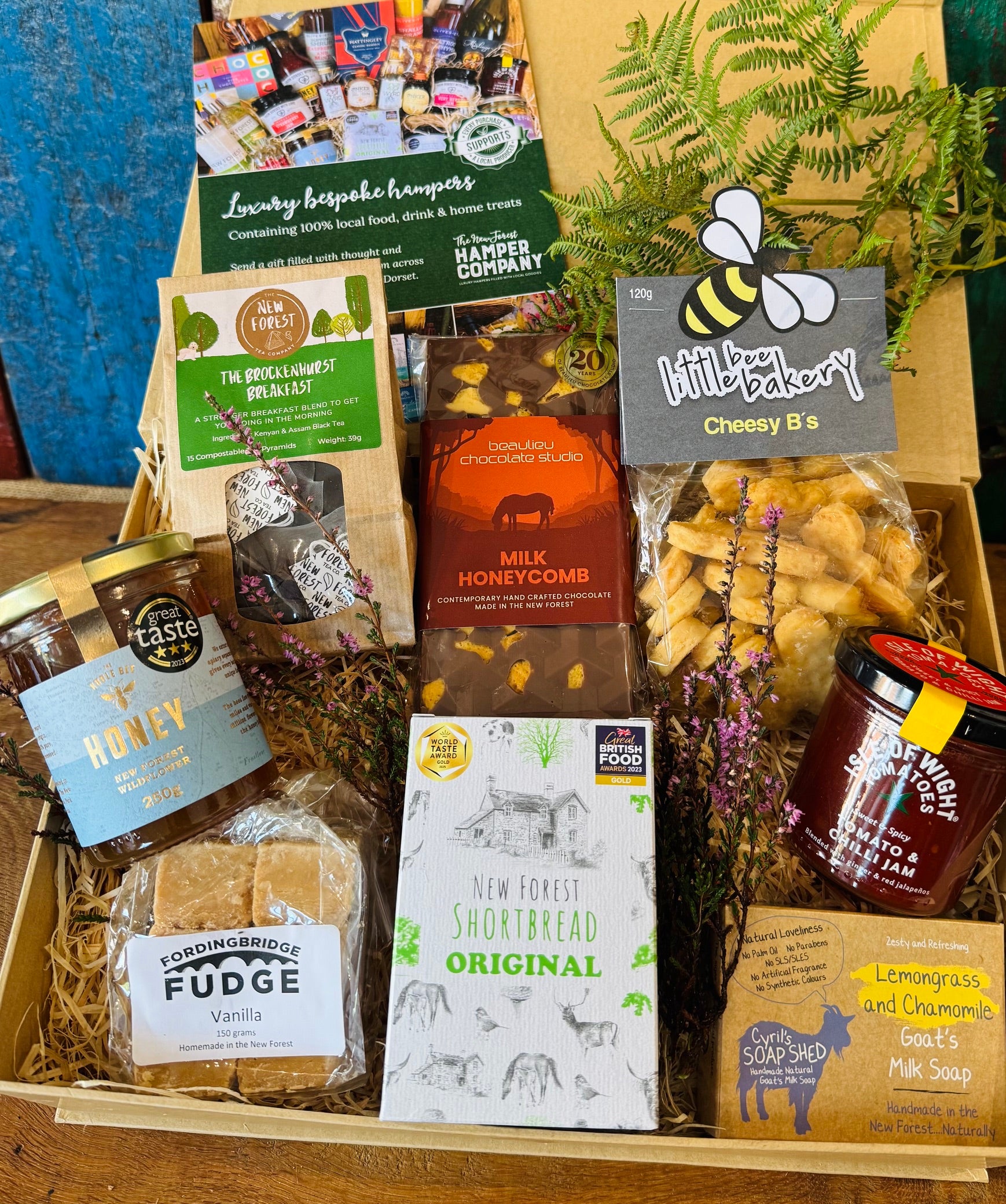 Hampshire Giftbox packed with New Forest wildflower honey, Brockenhurst Breakfast tea, Original shortbread, Beaulieu milk honeycomb chocolate, vanilla fudge, Cheesy B's, tomato chilli jam and goat's milk soap