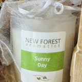 New Forest Aromatics Sunny Day candle in an organza bag