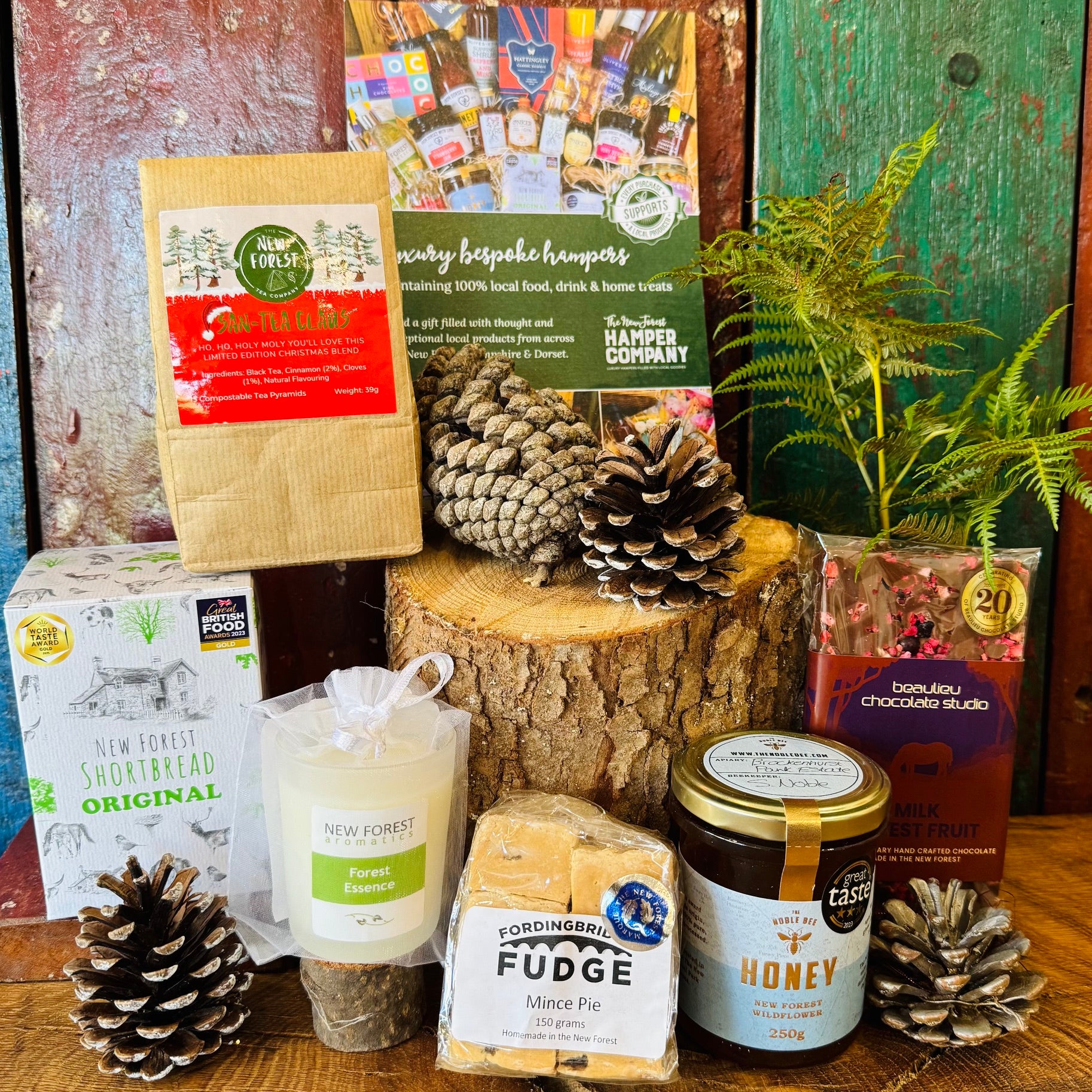 New Forest Marque Festive Giftbox contents displayed with San-Tea Claus limited edition Christmas tea and Great Taste three star New Forest wildflower honey