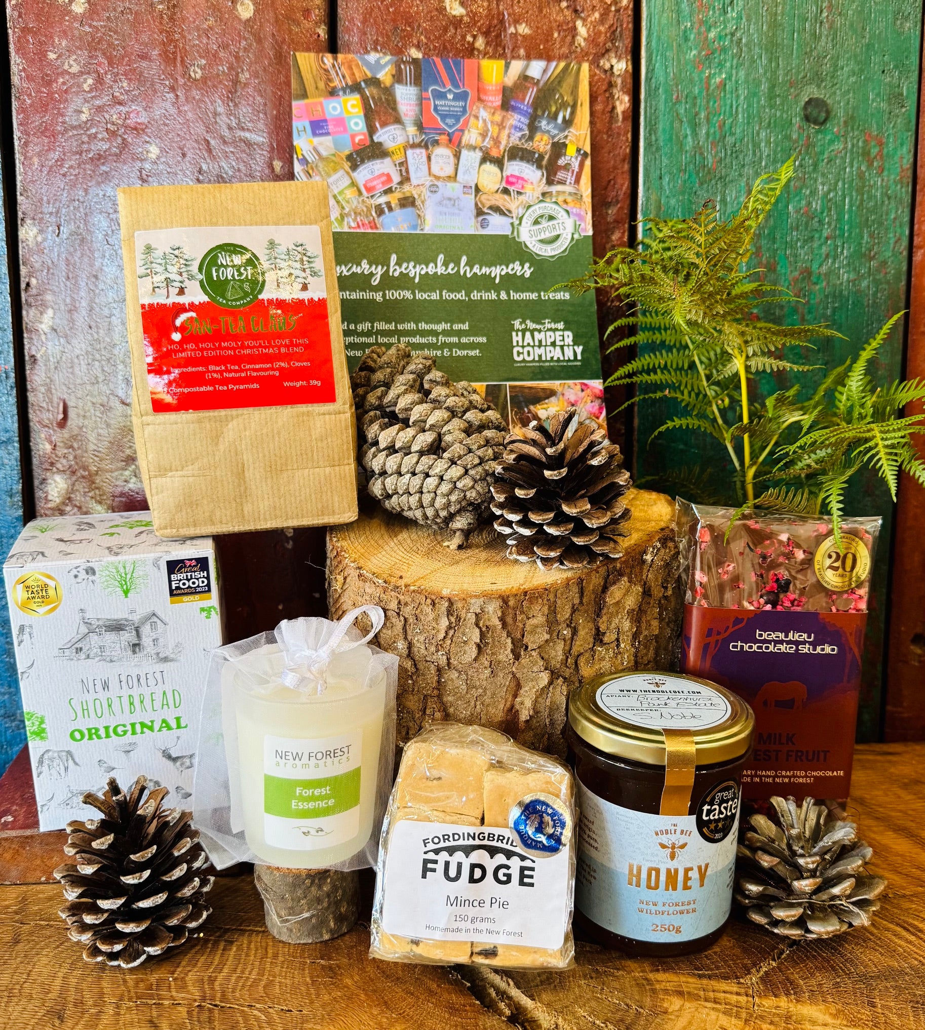 New Forest Marque Festive Giftbox contents displayed with San-Tea Claus limited edition Christmas tea and Great Taste three star New Forest wildflower honey