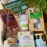 New Forest Marque Giftbox contents styled with fresh fern and heather from the New Forest
