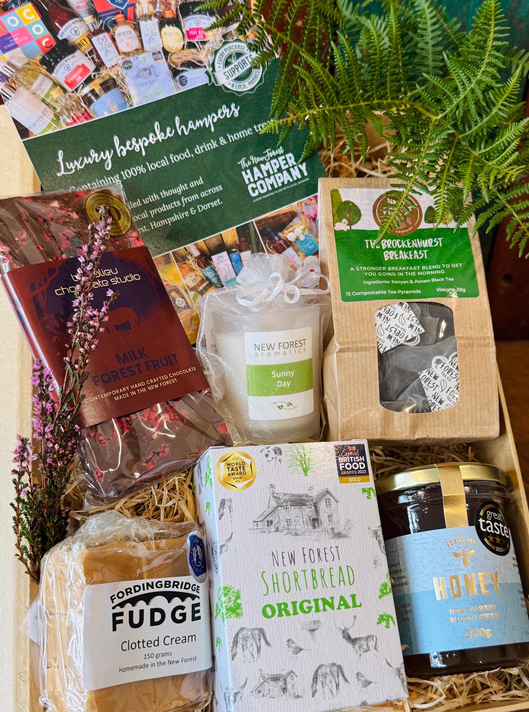 New Forest Marque Giftbox contents styled with fresh fern and heather from the New Forest