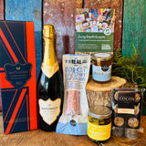 Hattingley Gourmet Grazer contents laid out with the Classic Reserve gift box, Dorset salami, Greek mixed olives, Great Taste three star honey and hazelnut truffle cups