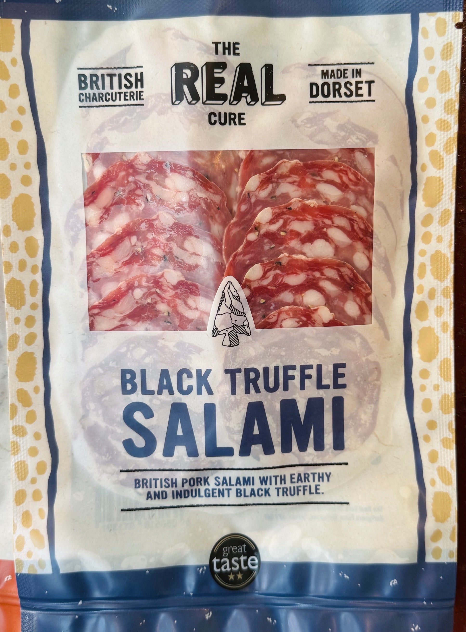 The Real Cure Black Truffle Salami 55g, British pork salami with earthy black truffle, with its Two Star Great Taste Award