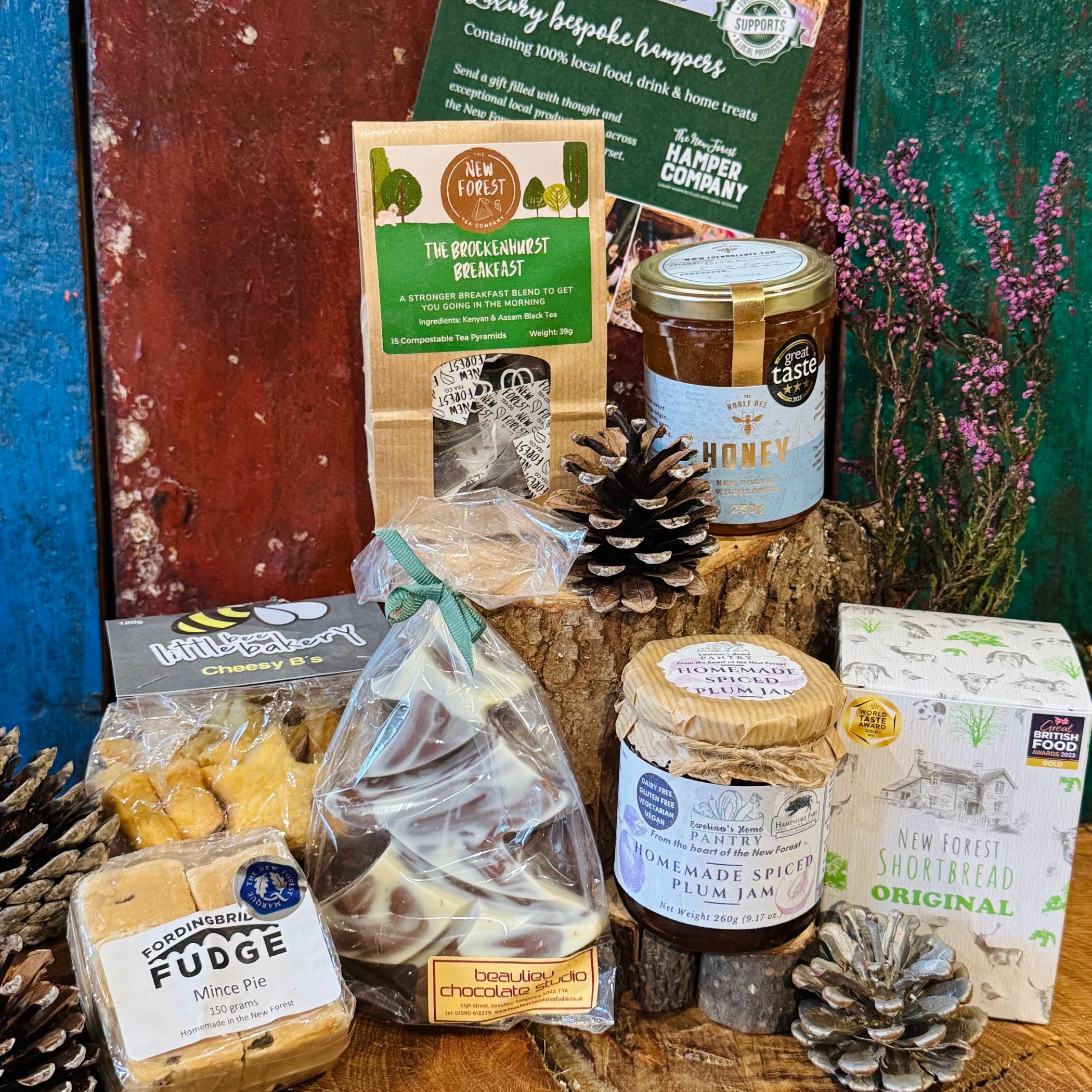 The New Forest Festive Favourites Giftbox contents displayed side by side, showing all seven New Forest festive treats