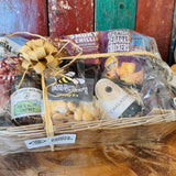 The Perfect Evening In Hamper wrapped in cellophane with a raffia bow, ready to give