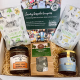 The Brockenhurst Tea & Treats Postal Box with Brockenhurst Breakfast tea, Noble Bee New Forest wildflower honey, Three Fruit marmalade and two bags of New Forest Shortbread