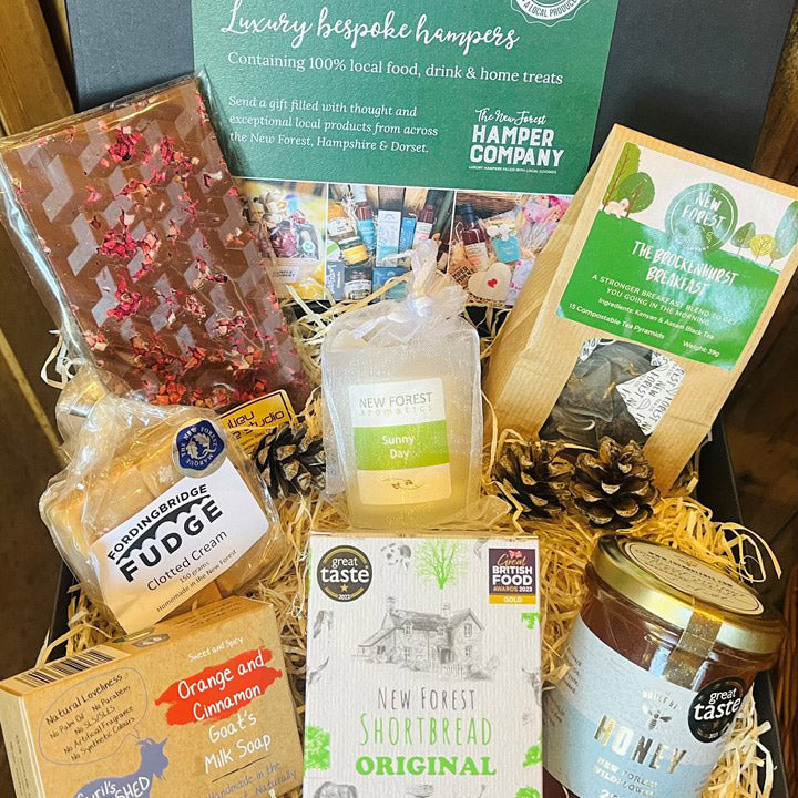 New Forest Marque Giftbox with artisan chocolate, New Forest honey, New Forest shortbread, tea, fudge, candle and natural soap.