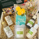 Gift hamper with products from New Forest and WARD, including soap, lotion, and bath oil.